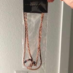 Brand new, unopened Quay sunnies chain.